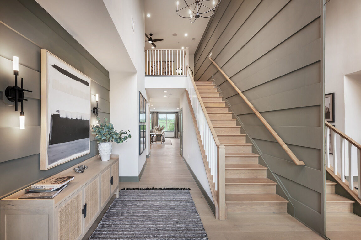 Modern farmhouse staircase with contemporary railings