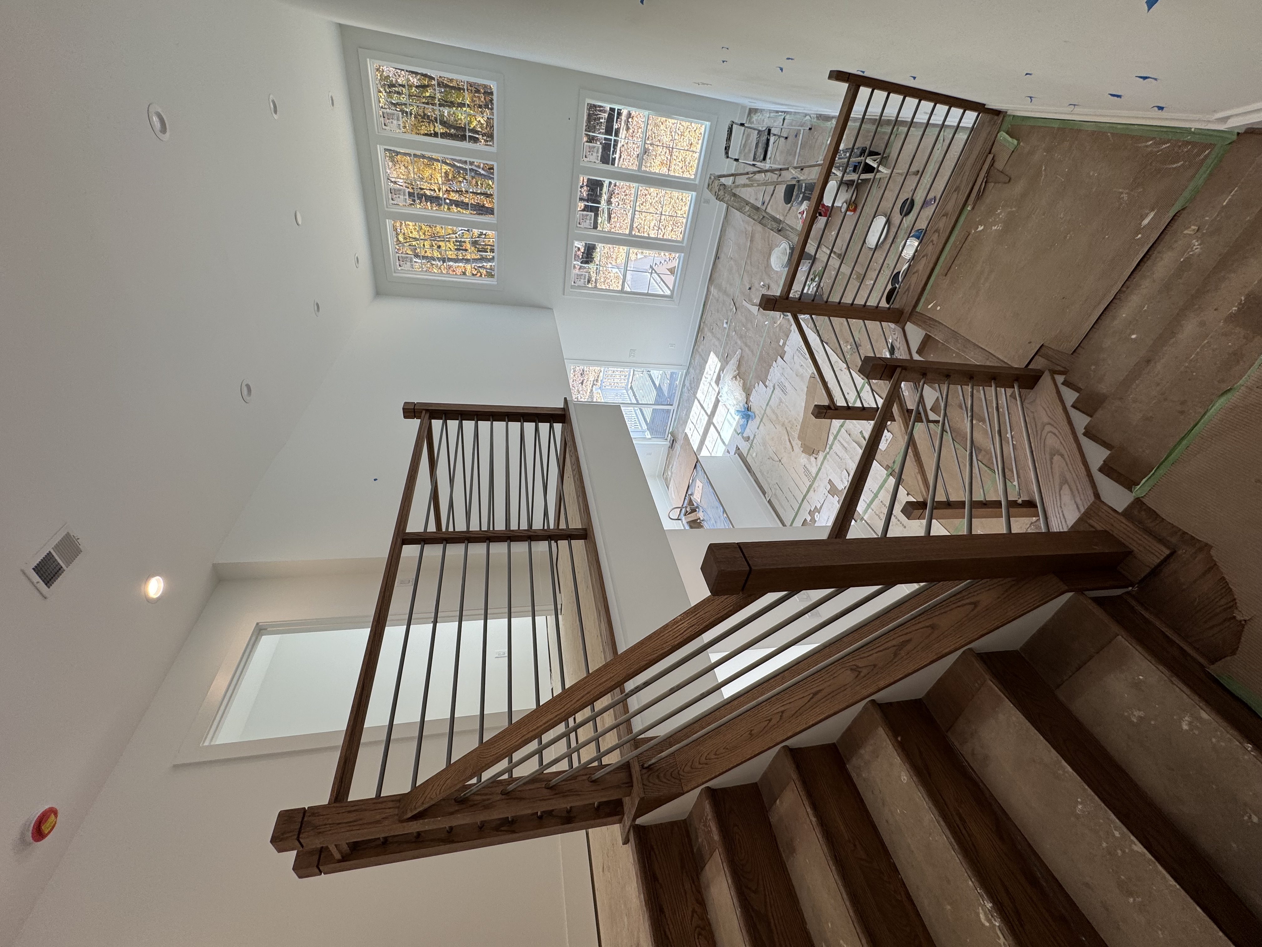 Modern staircase with metal and wood combination